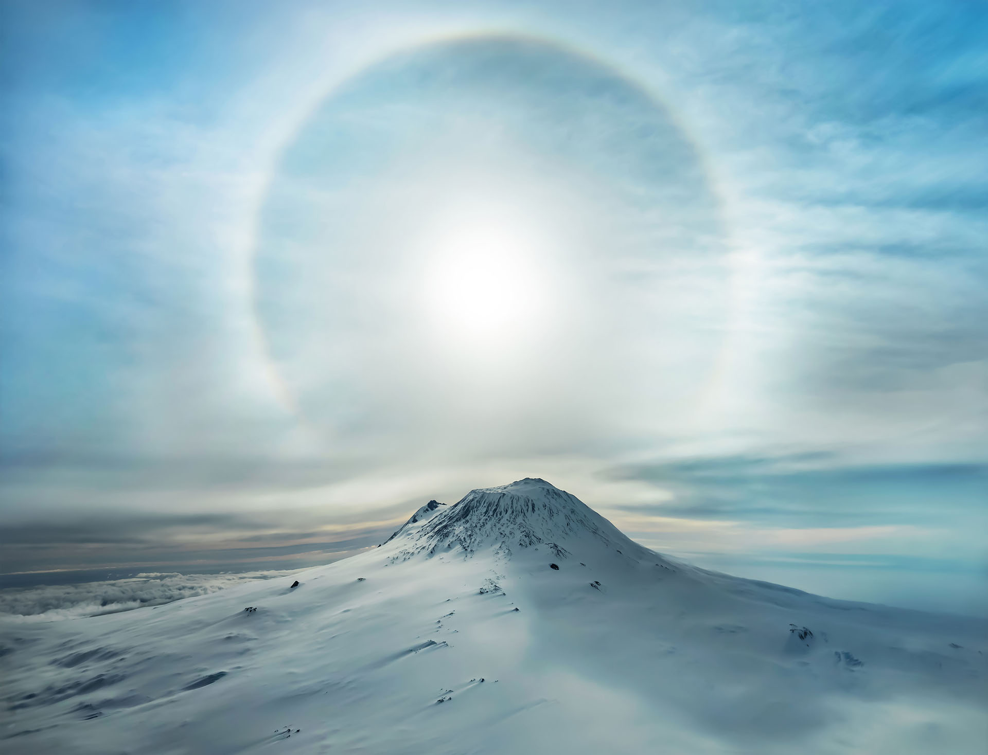A fine art landscape from Antarctica (Mount Erebus with sunbow) by Trey Ratcliff